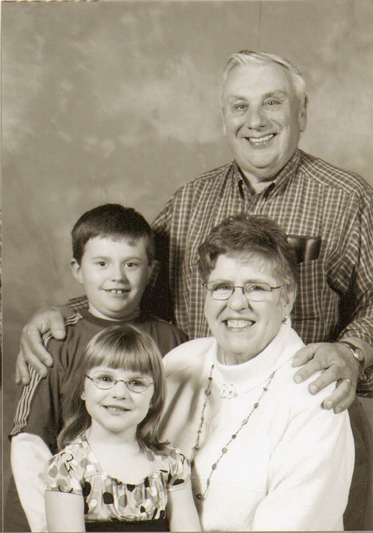 John and Nancy Miller (with grandchildren: Ryan and Kayla)